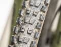 The lighter Grid Trail casing is designed for versatile trail use, rolls well and has reinforced sidewalls. The Grid Gravity version also uses reinforced sidewalls combined with a double-layer downhill casing for even more puncture protection.