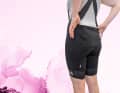 The straps are particularly wide at the back.  This design makes the SQlab particularly easy to pull back over the bum when peeing.