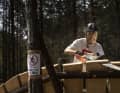 Hammering, sawing, tapping: Tomomi at work.