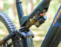 The rocker link and shock yoke are made of aluminium, while the main frame and rear triangle are made of carbon.