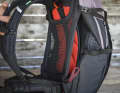 A system comprising four loops allows the Trailcontrol to be adjusted between the mesh and contact backs whilst riding.