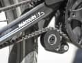 The belt tensioner keeps the Gates carbon belt in tension. Lubrication is not necessary, brushing off dirt from time to time is sufficient.