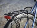 Luggage carriers with a platform and spring clip are extremely versatile. But reduced models also harmonise well with panniers.