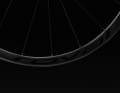 The rims of the Roval Control World Cup are made of carbon and have an asymmetrical profile.   According to Specialized, this enables a more even spoke tension and increases stiffness.