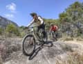 Light e-MTB with a handling advantage or a power bike without range anxiety? At the EMTB Trailcamp, we test both options extensively off-road with our readers.