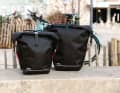 The bags are made of waterproof material that is also robust enough for travelling by bike.