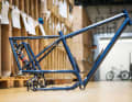 The first full-suspension touring bike from 2006 now hangs in the ancestral gallery.