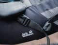 The large buckles on the saddlebag must be threaded over the saddle rails.