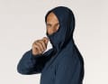 The hood of the Gonso jacket reaches over the mouth.