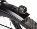 Supernova headlight with high beam function on the mudguard of the Canyon Pathlite:ON