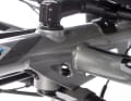 Directly in front of the rider's seat: head tube with "stem" and handlebar connection.