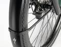 Wheel guard extended low down on the Specialized: keeps feet clean and dry in wet conditions