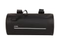 The logo and the line on the front of the handlebar bag reflect