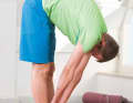Stretching exercise for the back, avoid rocking or jerky movements during stretching exercises