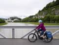 Beyond the flat banks of the Salzach, the path becomes hilly, but never extremely steep.  An e-bike is therefore pleasant, but not really necessary.
