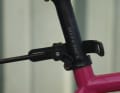 The third fixed point is still missing: a strap is placed around the seat post ...