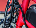 The front pannier rack can be quickly fitted or removed using quick-release levers.