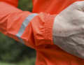 The sleeves are cut long, reflective material increases visibility in headlights
