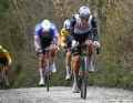 The aliens among themselves. Tadej Pogacar comes out on top and wins the Tour of Flanders, 2 April 2023.