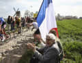 A celebration for the fans: spectators cheer on (from left) Mathieu van der Poel, Wout Van Aert and Filippo Ganna on the pavé section to Moulin-de-Vertain 2023