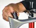 Some grease can also be applied under the classic clamps, which are slipped onto the round seat tube, and to the bolt. Integrated cone clamps should be dismantled and cleaned, but only the clamping screw should be greased. Otherwise the clamp may no longer hold properly. Grease can be applied to the post itself if the frame and post are made of metal, for example aluminium. If carbon fibre is used, be sure to use special assembly paste and keep the tightening torque low.
