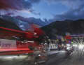 The sun has not yet risen over the mountains when the cyclists set off in Andermatt