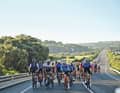 Group ride: The peloton rolls along the main roads, which are closed on one side, in a closed formation.