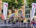 Motivational boost: The cyclists cheer loudly for all the men and women at the start.