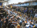 The Tour of Flanders is a huge festival for cycling fans - the pros sweat, the fans party and drink