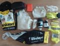 Clothing & sleeping equipment: thermal hat, thermal jersey, rain jacket, base layer, socks, bib shorts, leg warmers, arm warmers, winter gloves, latex gloves as rain protection, reflective waistcoat and straps, emergency bivi and sleeping bag
