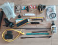 Tools: 2 spare inner tubes, mini pump, mini tool, Allen key, tyre levers, derailleur hanger, chain, chain lock, cleats, cable ties, rubber rings, patches and a piece of tyre, knife, chain wax, spare spokes and spoke nipples, mini lock, spare front light, Sram battery and charger