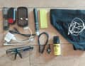 3 rear lights, navigation device, USB charging plug, charging cable and power bank, photochromatic sunglasses, pepper spray and whistle (dogs!), headphones, luxury: swimming trunks