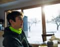 Emil Herzog looks out over the hills of the Allgäu from the living room of his parents' house