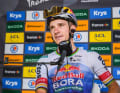 Remco Evenepoel during his winner’s interview ahead of the podium ceremony for his stage victory on the Plateau de Solaison