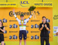 Remco Evenepoel at the podium ceremony following the time trial from Évian-les-Bains to Thonon-les-Bains