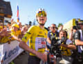 Tadej Pogacar at the finish line on Alpe d'Huez