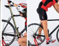 Left: Measuring the inside leg length: Stand in front of a wall, feet slightly apart, place the spirit level against the wall, press on the crotch (according to the saddle pressure) and measure the distance to the ground.
Centre: Multiply the inside leg length by 0.89 to obtain the seat height - this is the distance from the centre of the bottom bracket to the seat. The tolerance is around plus/minus 10 millimetres due to different pedal and shoe types.
Right: Quick test: With a flat racing shoe heel, the leg is loosely extended when the heel is placed on the pedal.

Better long than low: a comparison of four handlebar positions