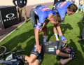 The picture from last year's Paris-Roubaix: John Degenkolb is in tears after his crash, Mathieu van der Poel and Jasper Philipsen try to console him.