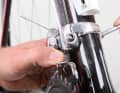3. if one of these two conditions is not met, slacken the derailleur cable by shifting to the small chainring. Loosen the fixing screw of the front derailleur on the frame mount or on the clamp on the frame by turning it one or two turns anti-clockwise.