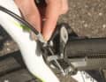 If you are not sure of your footing, the simple trick of applying a brake will help. Open the brake release lever, unscrew the tensioning screw a few turns and close the release lever again.