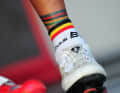 Not always in harmony with his cycling socks: Philippe Gilbert (Quick Step-Floors) wears world champion stripes on his lower right leg.
