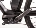 The mid-motor drives the crank and delivers a brute boost in "Boost" mode