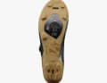 La semelle offre une bonne adhérence, et la plaque de fixation du système de crampons est interchangeable.