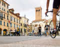 Bassano del Grappa attracts visitors to its pretty old town centre with its typical Italian flair.