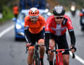 Around twelve kilometres before the finish, the last two breakaway riders, Alexander Kamp (front) and Aleksandr Grigorev, are caught up