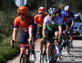 A breakaway group pulls away from the peloton