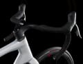 Racing handlebars on a marathon racing bike: the Italians took the carbon cockpit from the Zero SLR. 