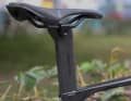 The seatpost on Degenkolb's aero bikes is made from a single piece of carbon, whereas Scott uses a two-piece seatpost on the production model.