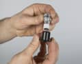 Apply a thin layer of grease to the other threads to significantly reduce internal friction. The steering bearing can then be adjusted easily and precisely.