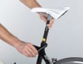 3. mark the extension length of the seat post with adhesive tape and remove it. If you turn the bike upside down, most of the water will run out if you tilt the frame back and forth a little.